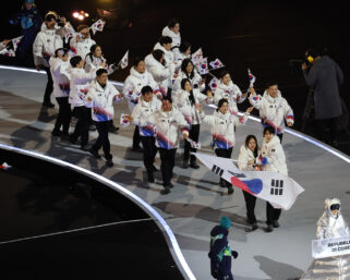 Skaters honored to carry flags at Olympic Opening Ceremony